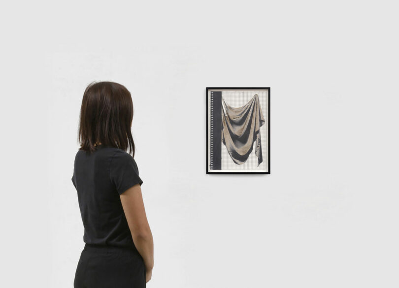 viewer with framed image of drapery 