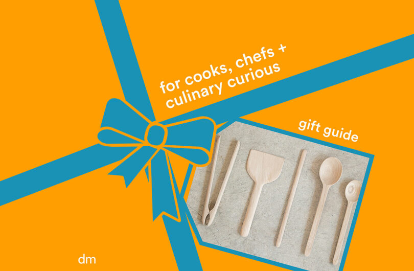 Gift guides for cooks, chefs, and the culinary curious, featuring an image of five wooden kitchen utensils on a beige surface, beautifully framed by blue ribbon graphics.